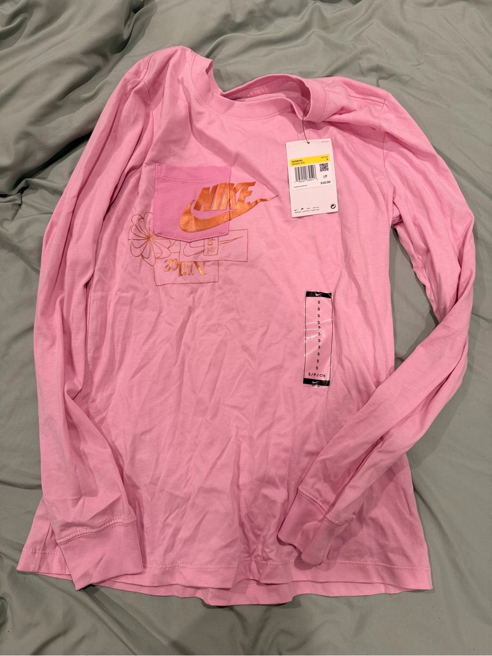 Nike Pink Long Sleeve Tee with Orange Swoosh Graphic